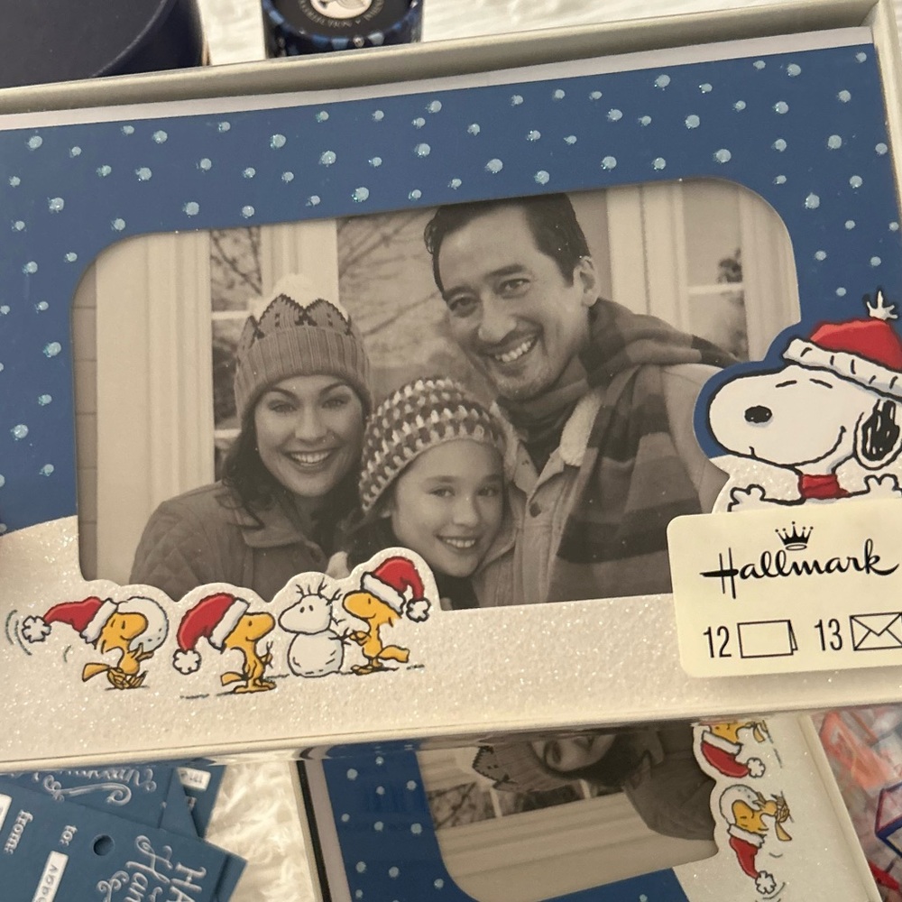 2 packages of 12 (36 total) snoopy holiday cards with photos to be inserted